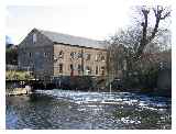 The Mill and slalom gates on the River Calne at the Coy Carp pub © Jon Combe