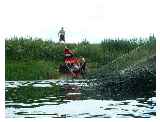 Getting back in after portaging the weir