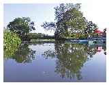 There is a very low bridge by the pub but it is do-able with a bit of serious limbo